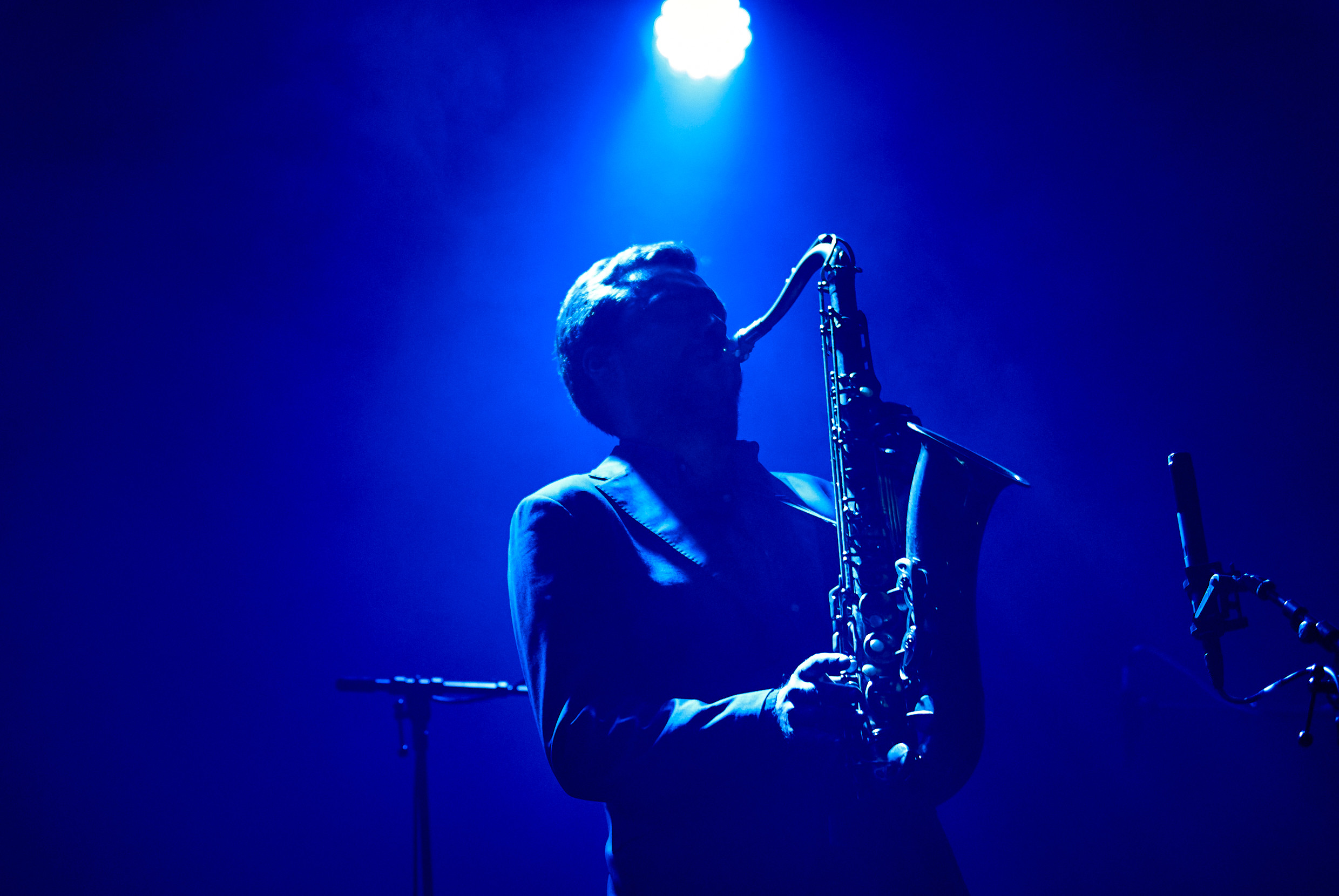 Saxophonist Timo Lassy under blue stage light at Porvoo Jazz Festival 2014