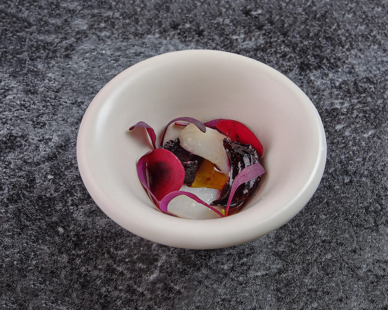 Beetroot petals in a white bowl, a dish by chef Nico Lehto at Vår
